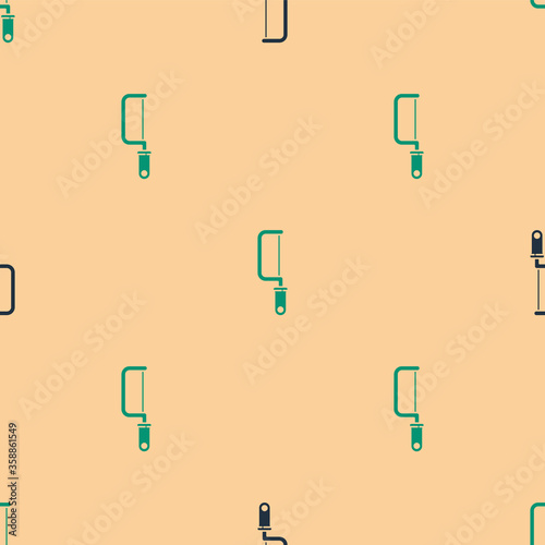 Green and black Hacksaw icon isolated seamless pattern on beige background. Metal saw for wood and metal.  Vector Illustration
