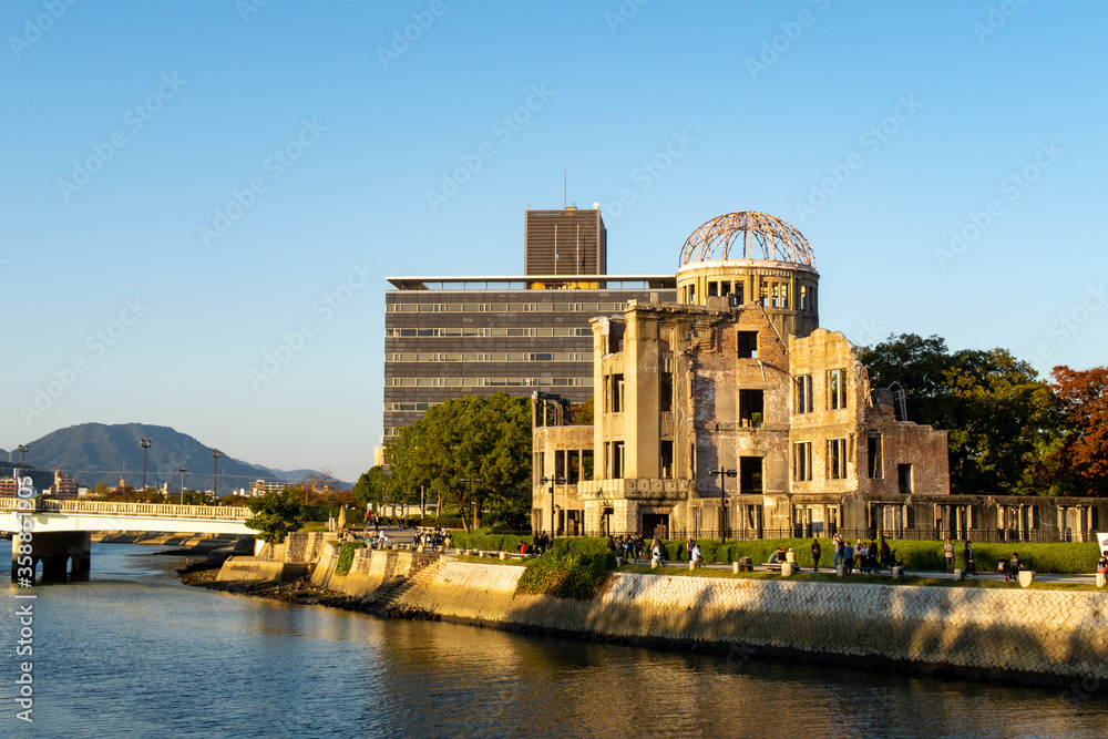 Hiroshima view with famous Hiroshima Peace Memorial (Atomic Bomb Dome) during sunset, Japan.
