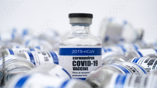 COVID-19 Corona Virus 2019-ncov Vaccine injection vials medicine drug bottles. Vaccination, immunization, testing, treatment to cure Covid-19 Corona Virus infection. Healthcare And Medical concept.