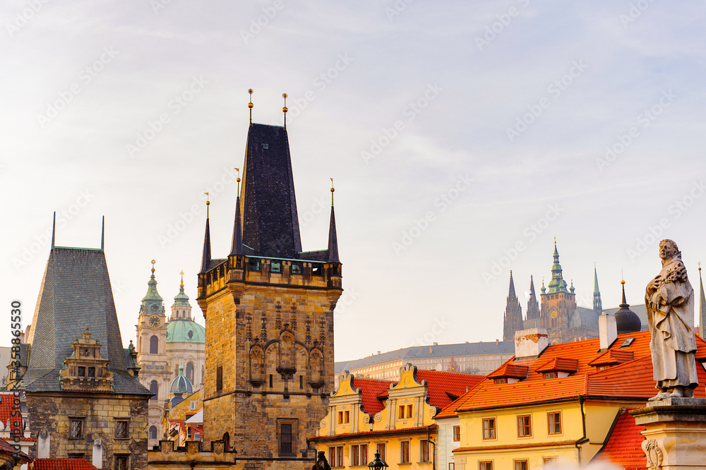 Tower of the Charles Bridge,and the Prague castle in Prague, Czech Republic.