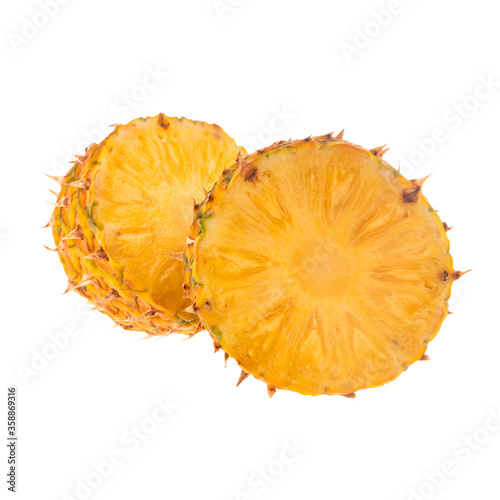 two halves of fresh pineapple isolated onw hite background