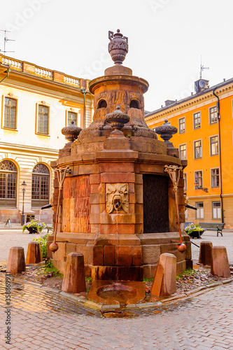 The well, Stortorget, The Big Square, Stockholm, Sweden. photo