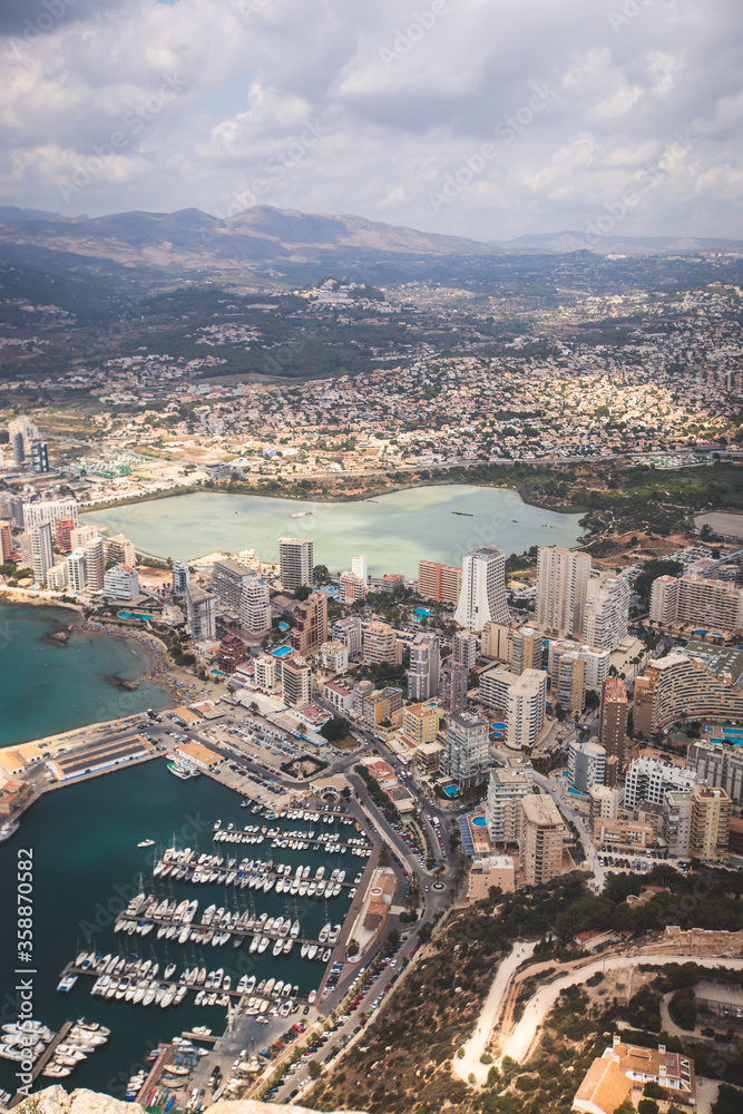 View of Calpe Calp town with Penon de Ifach mountain during the hiking to Penyal d'Ifac Natural Park, Marina Alta, province of Alicante, Valencian Community, Spain