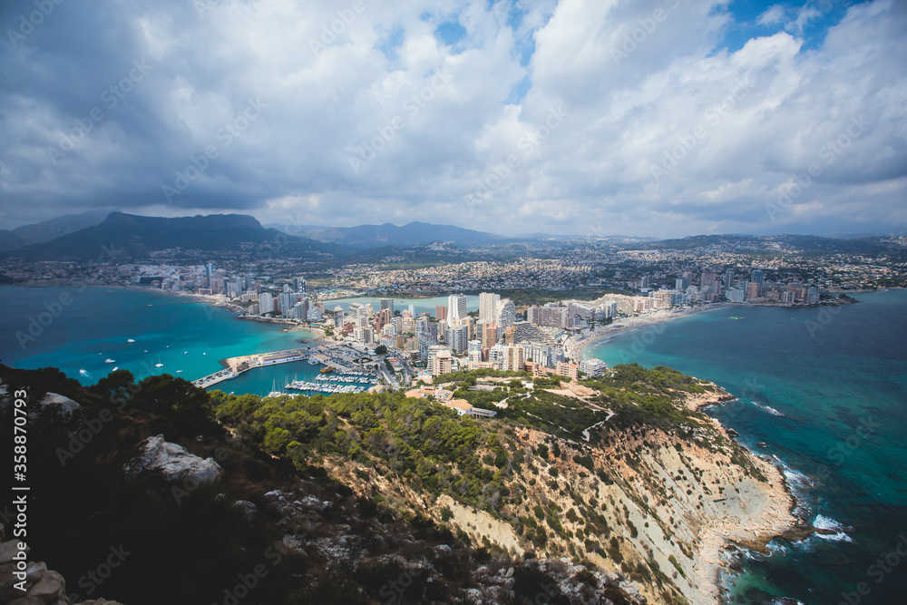 View of Calpe Calp town with Penon de Ifach mountain during the hiking to Penyal d'Ifac Natural Park, Marina Alta, province of Alicante, Valencian Community, Spain
