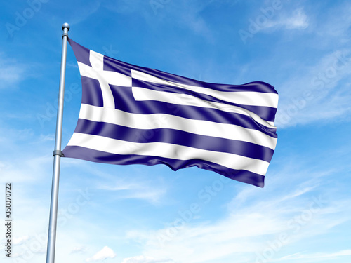 Greece flag on a pole against a blue sky background.