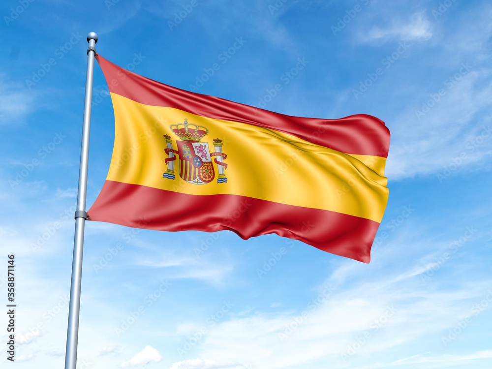 Spain flag on a pole against a blue sky background. Spain flag on a pole against a blue sky background.