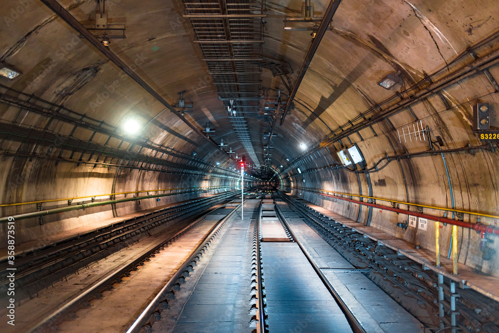 Front view of train tracks in the tunnel Front view of train tracks in the tunnel