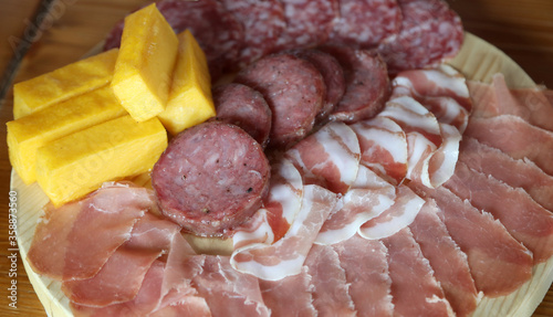 Tableau sur toile cold cuts and yellow polenta in the farmhouse
