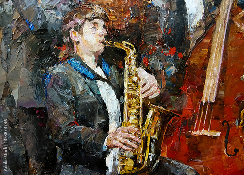 Photography A young musician in a tuxedo playing jazz on the saxophone