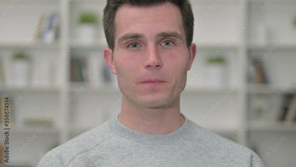 Portrait of Smiling Young Male Designer Looking at the Camera Portrait of Smiling Young Male Designer Looking at the Camera