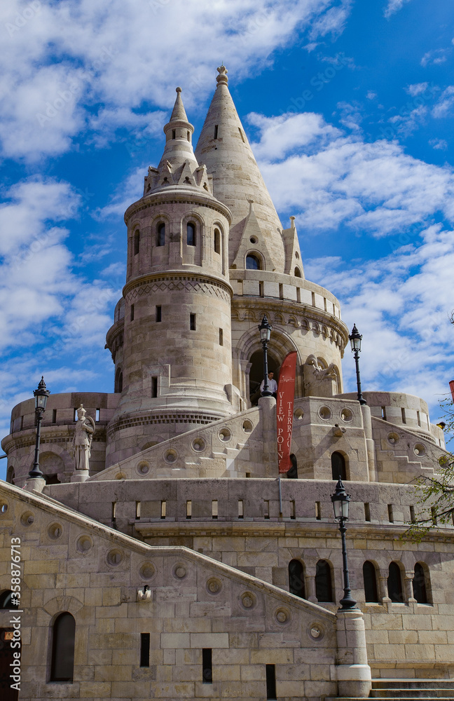 It's Fisherman's Bastion, on the Buda bank of the Danube, on the Castle hill in Budapest, around Matthias Church.
