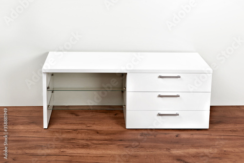 Stylish dresser on white background. Furniture for wardrobe room © giryakson