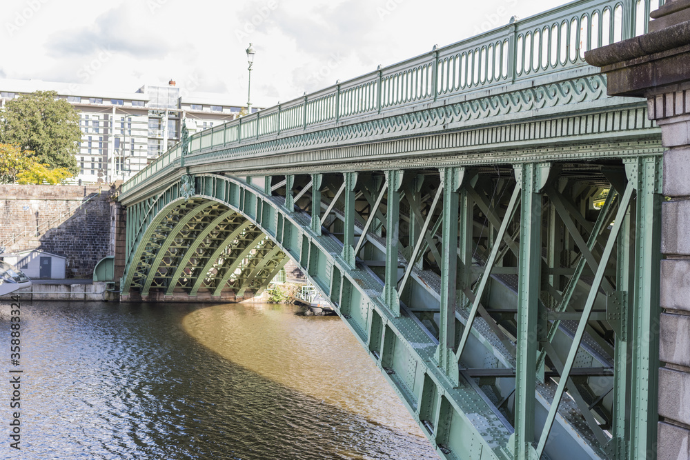 Naklejka premium iron bridge over a river