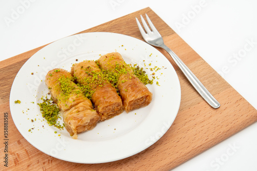 Turkish burma baklava on wooden floor