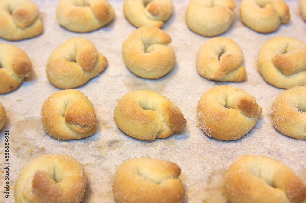 Anise rolls lined up after being baked Anise rolls lined up after being baked
