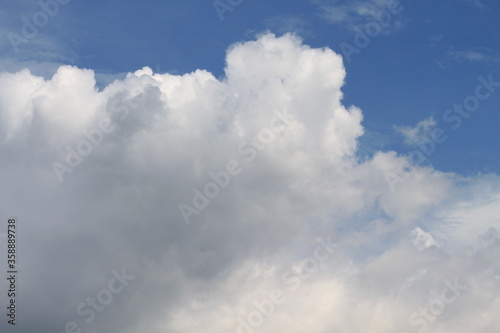 Fototapeta Naklejka Na Ścianę i Meble -  sky, clouds, blue, cloud, nature, white, weather, day, cloudy, cloudscape, heaven, summer, air, atmosphere, fluffy, light, cumulus, blue sky, sunny, beautiful, clear, sun, bright, abstract