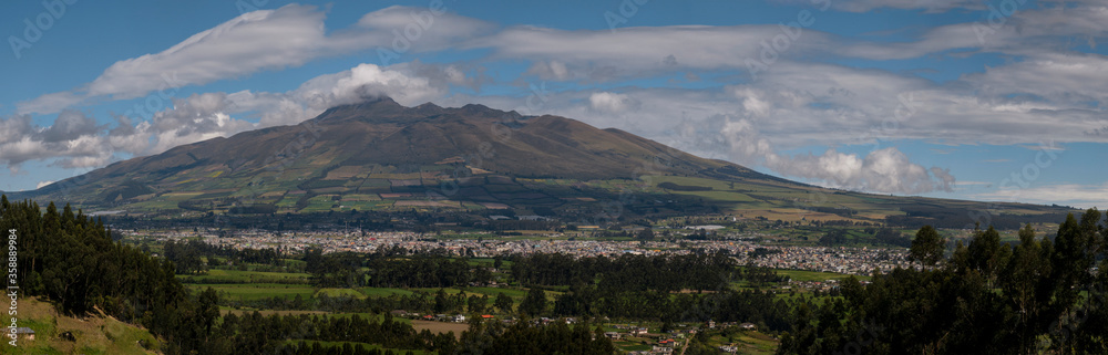 Panoramic photo of the city of Machachi with the background of the volcano heart in Ecuador