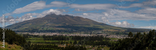 Panoramic photo of the city of Machachi with the background of the volcano heart in Ecuador photo