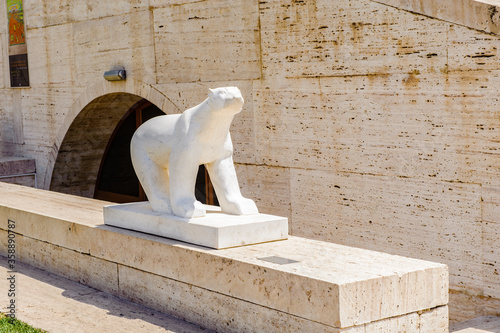 It's Modern art statue of a polar bear on the Yerevan Cascade, a giant stairway in Yerevan, Armenia. One of the most important sights in Yerevan completed in 1980 photo
