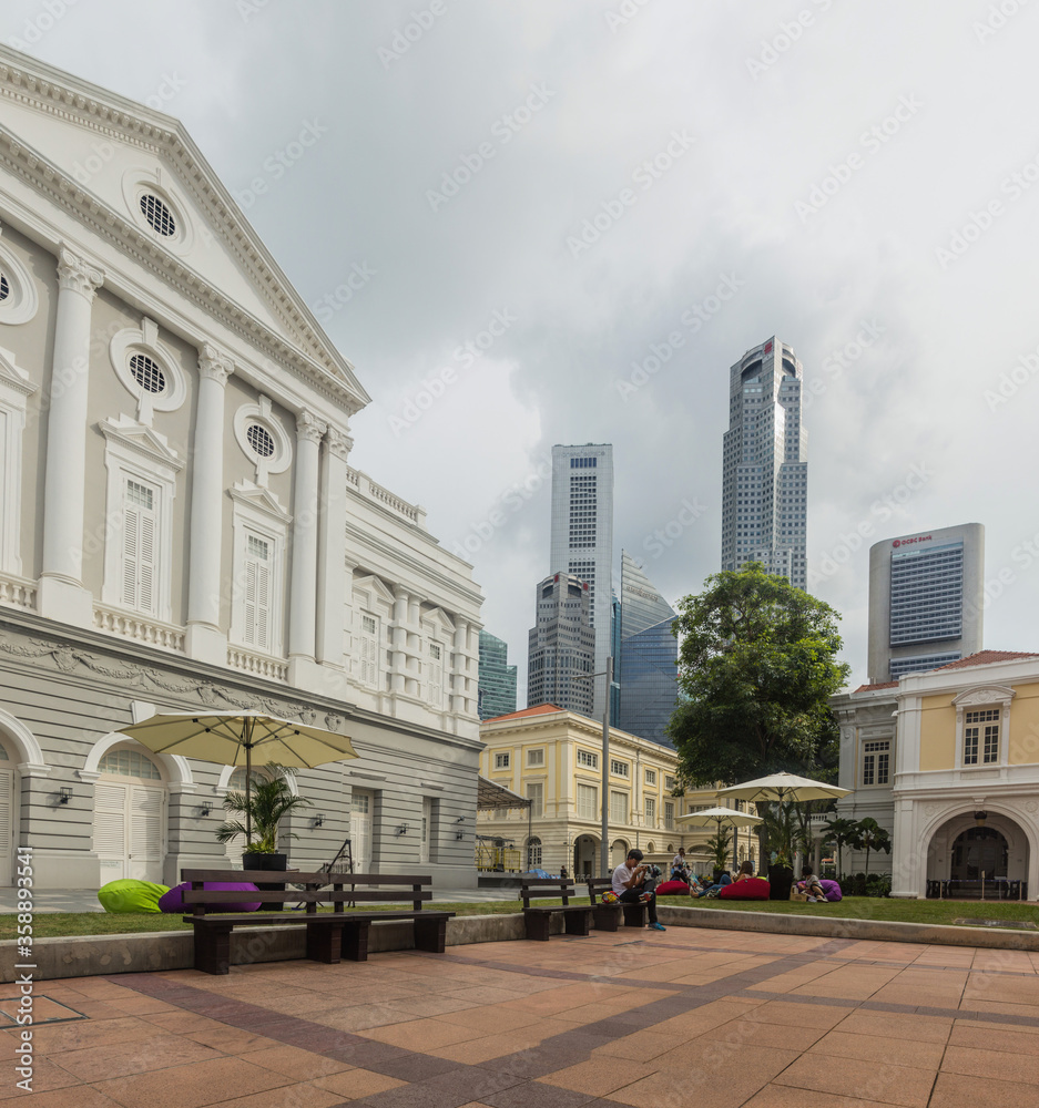 SINGAPORE, SINGAPORE - MARCH 11, 2018: View of the Old Parliament Lane in Singapore. Victoria Theatre and Concert Hall on the left.