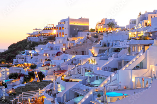 Sunset view of the town of Fira in Santorini, Greece.
