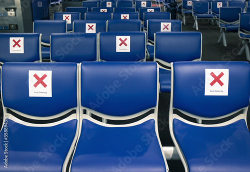 Social distancing concept: Keep spaced between each chairs at airport