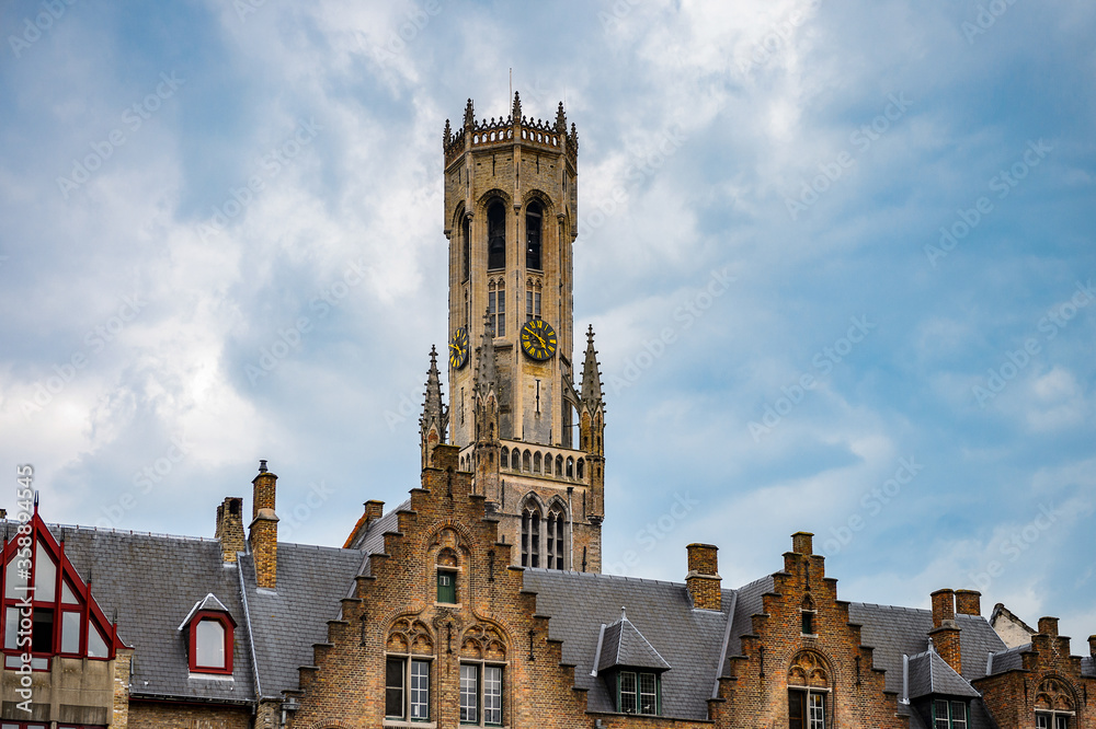 Fototapeta premium It's Bell tower in the Historic Centre of Bruges, Belgium. part of the UNESCO World Heritage site