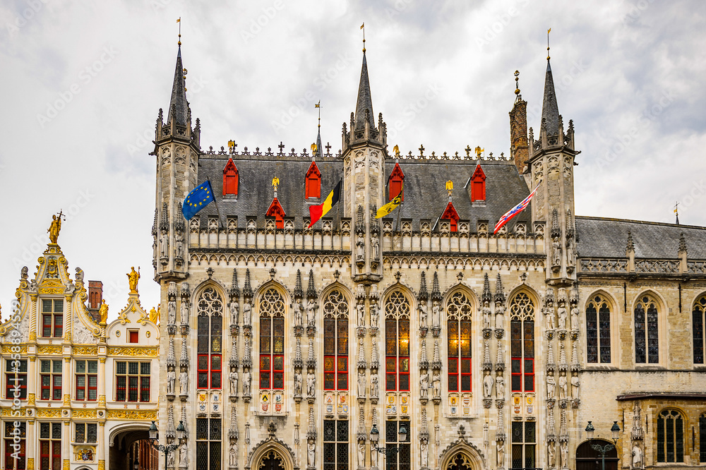 Fototapeta premium It's Architecture of the Market square in the Historic Centre of Bruges, Belgium. part of the UNESCO World Heritage site