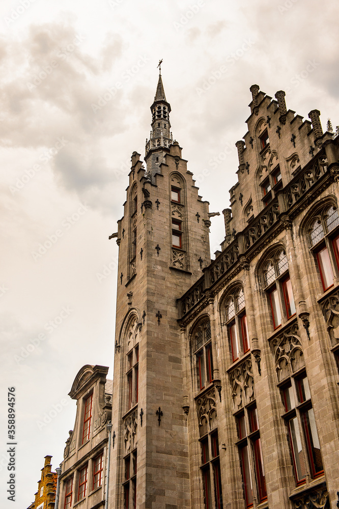 It's Architecture of the Market square in the Historic Centre of Bruges, Belgium. part of the UNESCO World Heritage site