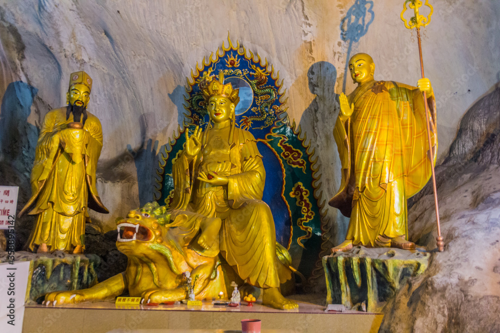 IPOH, MALAYASIA - MARCH 25, 2018: Sculptures in Perak Tong cave temple in Ipoh, Malaysia.