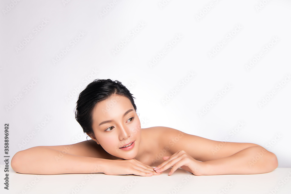 Beautiful Young Asian Woman with Clean Fresh Skin. Face care, Facial treatment, Cosmetology, beauty and healthy skin and cosmetic concept, woman beauty skin isolated on white background. Beautiful Young Asian Woman with Clean Fresh Skin. Face care, Facial treatment, Cosmetology, beauty and healthy skin and cosmetic concept, woman beauty skin isolated on white background.