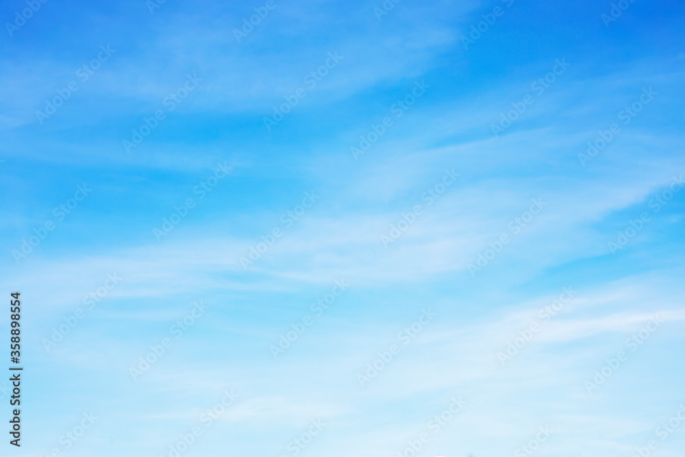 Fantastic soft white clouds against blue sky and copy space.