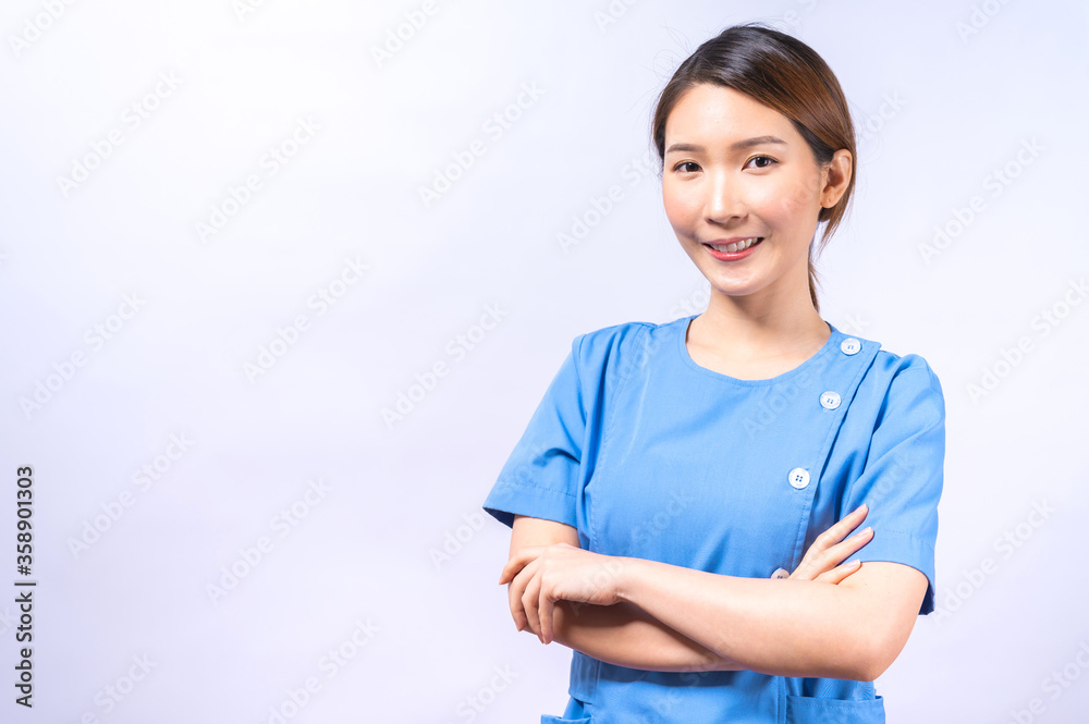 Portrait of smiling Asian nurse isolated on white background Portrait of smiling Asian nurse isolated on white background