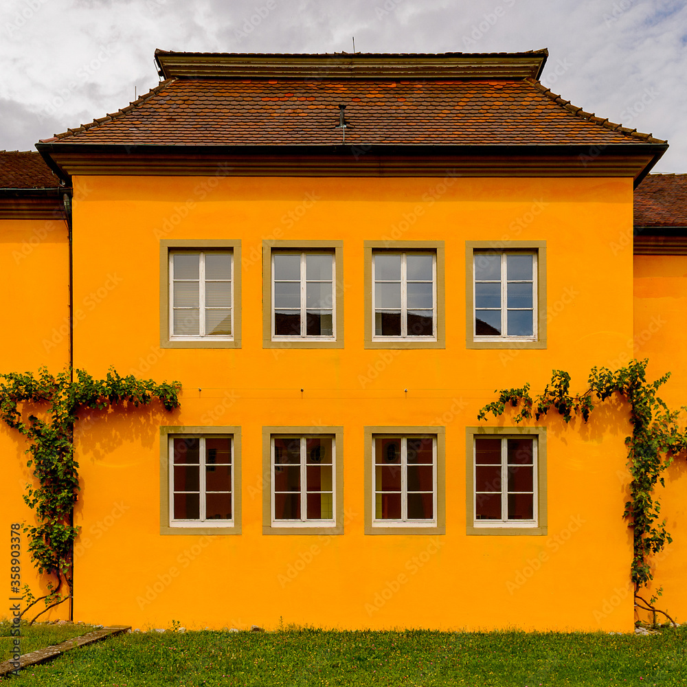 Yellow building of Meersburg, a town of Baden-Wurttemberg in Germany at Lake Constance. Yellow building of Meersburg, a town of Baden-Wurttemberg in Germany at Lake Constance.