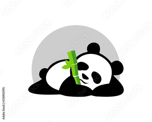 Sleeping panda with a bamboo