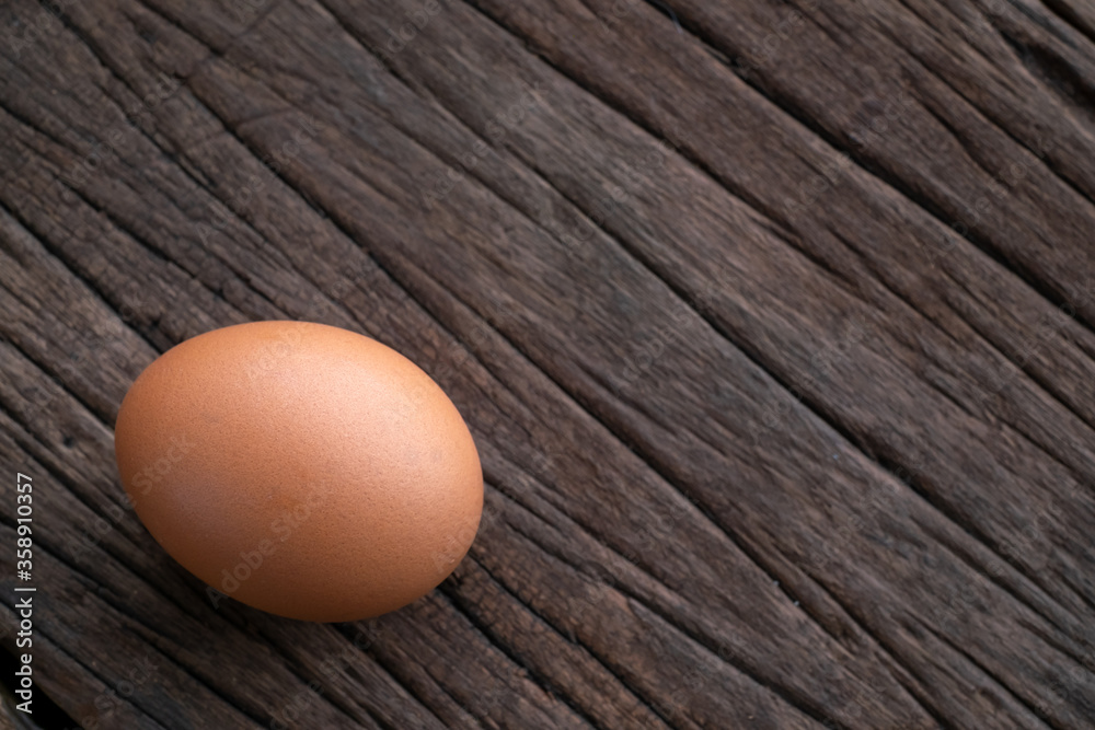 Chicken Eggs on wooden background. easter