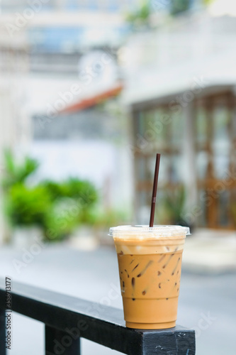 Iced coffee in take away cup (plastic glass)