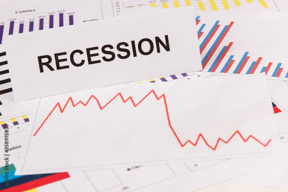 Inscription recession and declining chart as risk of financial crisis caused by coronavirus Inscription recession and declining chart as risk of financial crisis caused by coronavirus
