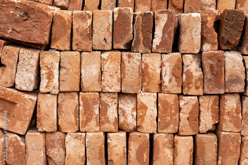 Obraz na plátně Exposed brick wall or wall, with apparent mortar