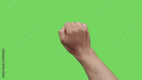 4K footage real time hand of asian man knocking isolated on chroma key green screen background.