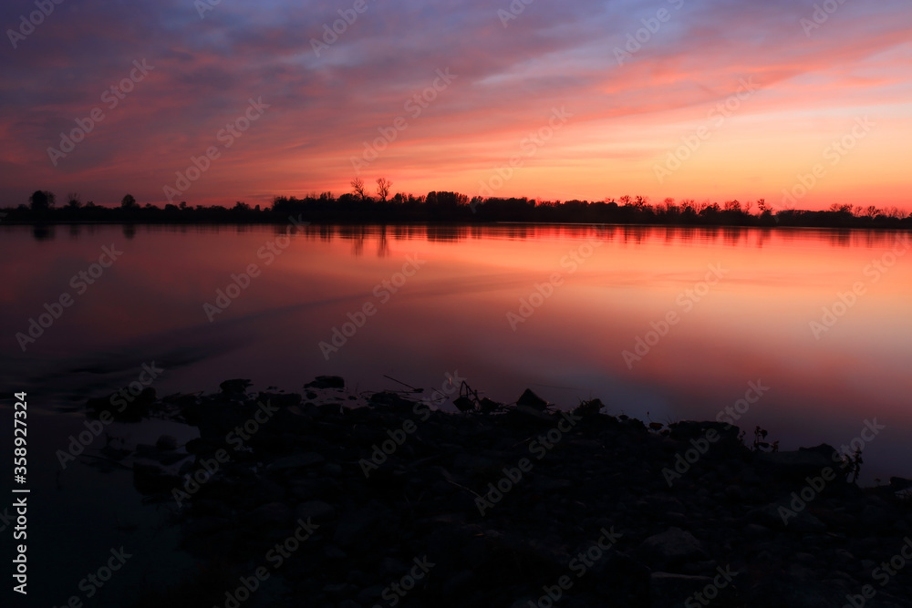 
Colorful sunset by the Odra River, Poland.