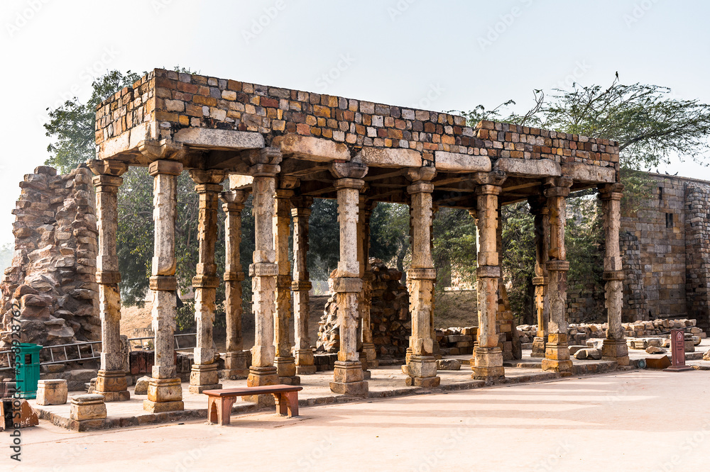 Fototapeta premium It's Qutb complex (Qutub), an array of monuments and buildings at Mehrauli in Delhi, India. UNESCO World Heritage Site