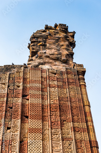 It's Qutb complex (Qutub), an array of monuments and buildings at Mehrauli in Delhi, India. UNESCO World Heritage Site photo