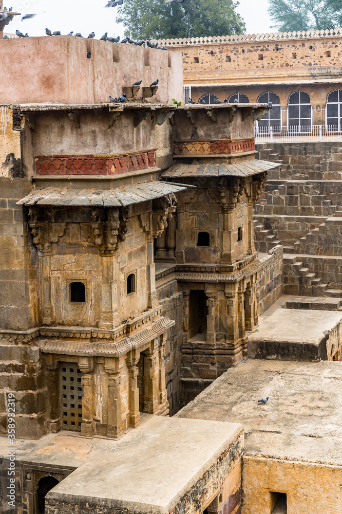 Fototapeta premium It's Part of the Chand Baori, a stepwell in the village of Abhaneri near Jaipur, state of Rajasthan. Chand Baori was built by King Chanda of the Nikumbha Dynasty