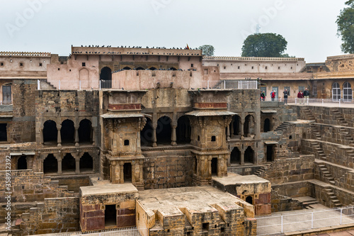 It's Part of the Chand Baori, a stepwell in the village of Abhaneri near Jaipur, state of Rajasthan. Chand Baori was built by King Chanda of the Nikumbha Dynasty photo