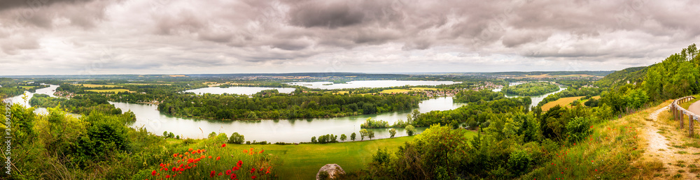 Large view by wide angle on the Seine River close to Rouen in France.