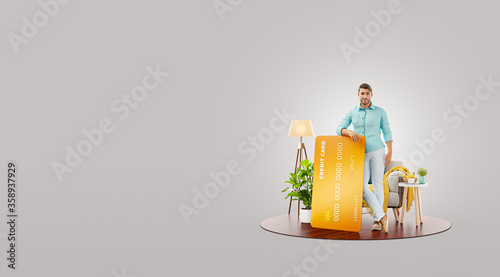 Smiling young man with credit card