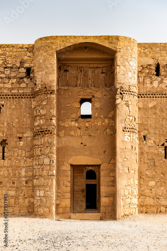 It's Front part of the Qasr Kharana, one of the best-known of the desert castles in eastern Jordan photo