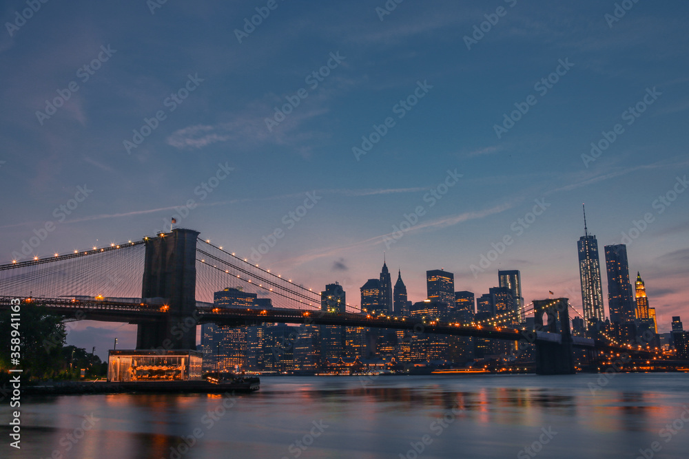 Brooklyn Bridge and Manhattan Skyline at sunset 