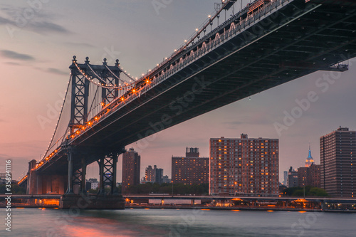 Manhattan Bridge and City Skyline at sunset © Zimu